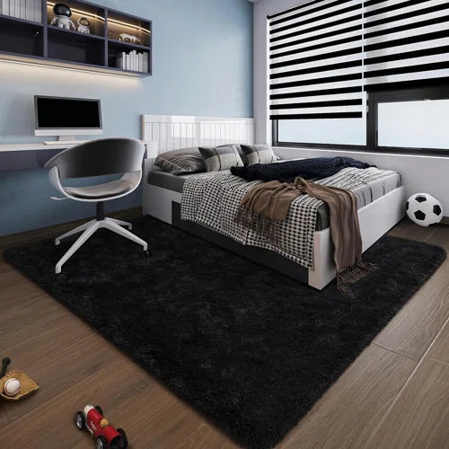 Antrese Shag Black Area Rug